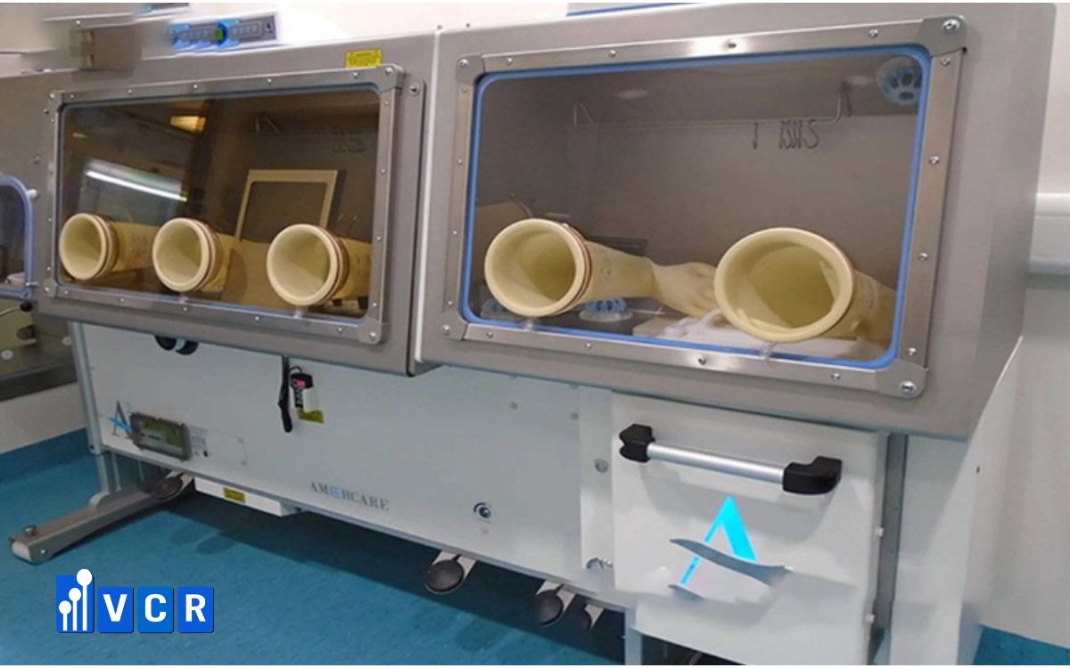 Should every isolator be equipped with a double-glove system?